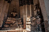 Ayutthaya, Thailand. Wat Chaiwatthanaram, the remains of Buddha statues inside the corner chedi of the gallery. 